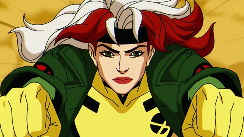 Episode still: Rogue raises her fists, ready to fight, in her green and yellow uniform